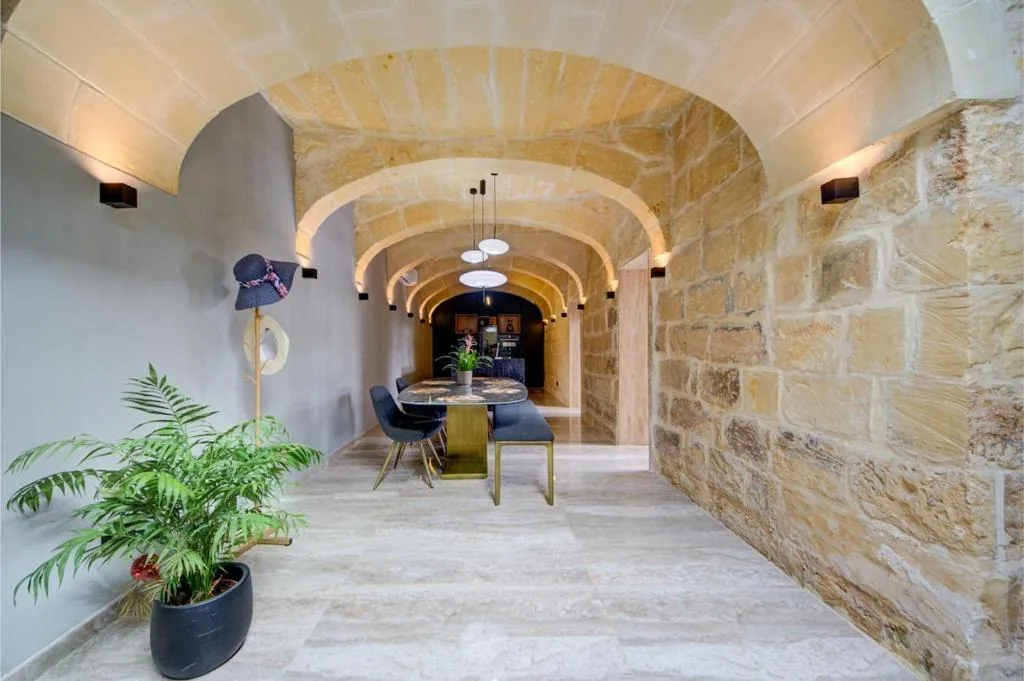 The vaulted stone passage through to the kitchen